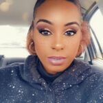 woman showing her cut crease eye look